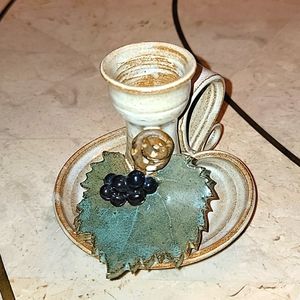 POTTERY TAPER CANDLE HOLDER WITH A GRAPE CLUSTER  & SIGNED BY ARTIST